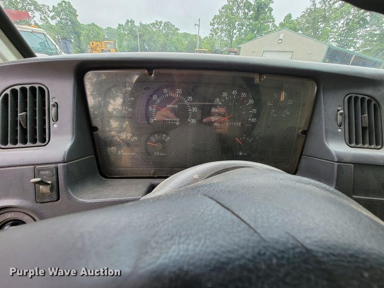 image for item IF9843 1999 Sterling A9500  roll-off container truck