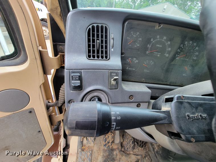 image for item IF9843 1999 Sterling A9500  roll-off container truck