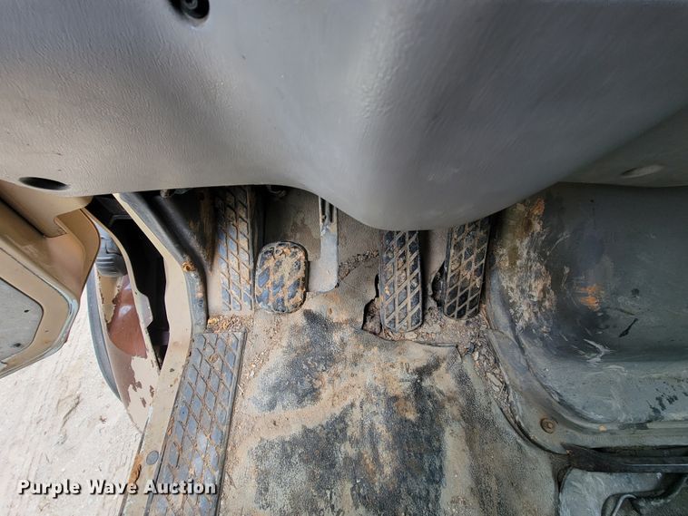 image for item IF9843 1999 Sterling A9500  roll-off container truck