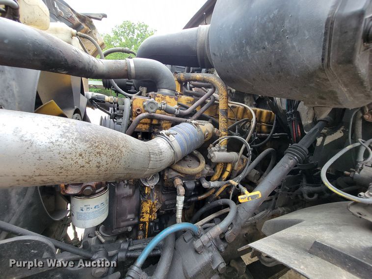 image for item IF9843 1999 Sterling A9500  roll-off container truck