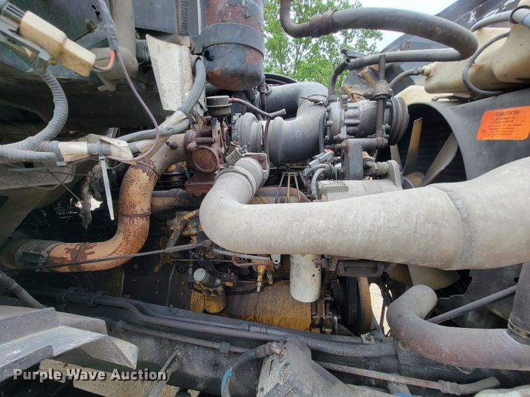 image for item IF9843 1999 Sterling A9500  roll-off container truck