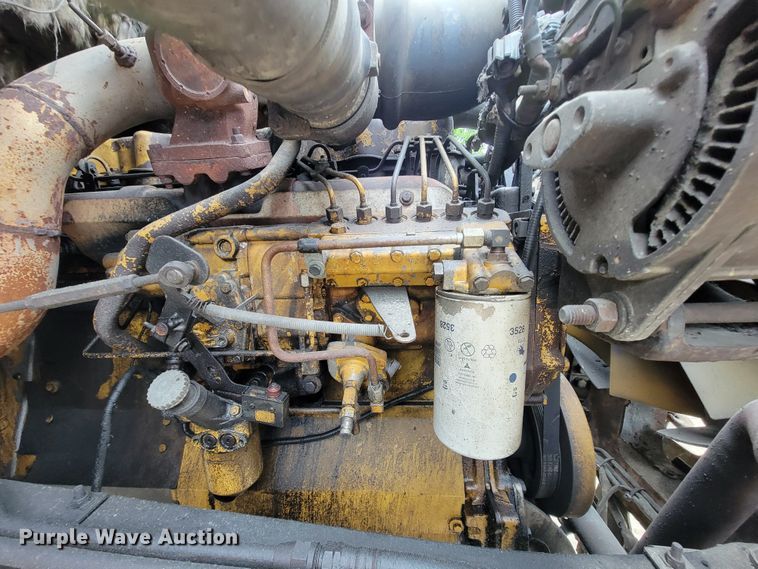 image for item IF9843 1999 Sterling A9500  roll-off container truck