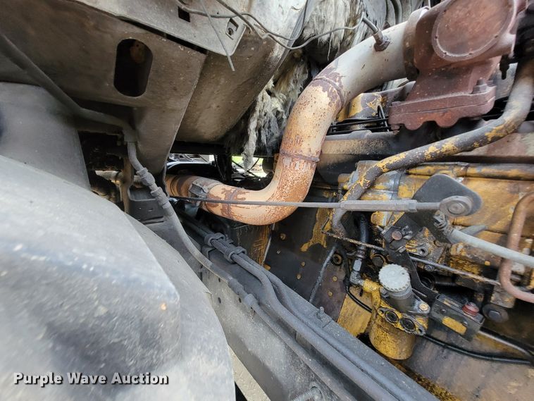 image for item IF9843 1999 Sterling A9500  roll-off container truck