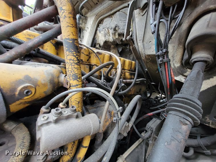 image for item IF9843 1999 Sterling A9500  roll-off container truck