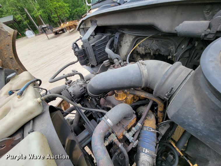 image for item IF9843 1999 Sterling A9500  roll-off container truck