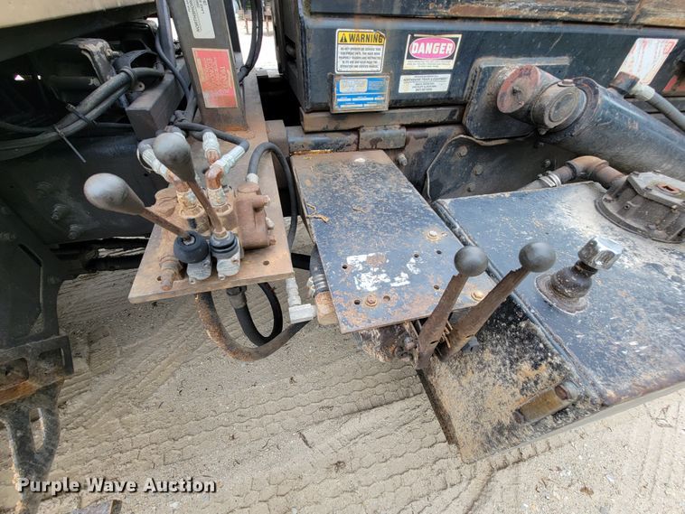 image for item IF9843 1999 Sterling A9500  roll-off container truck