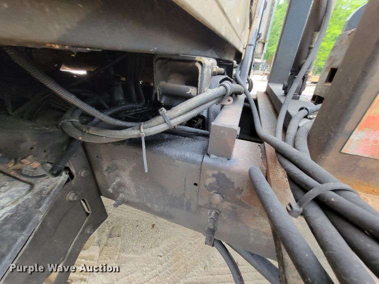 image for item IF9843 1999 Sterling A9500  roll-off container truck