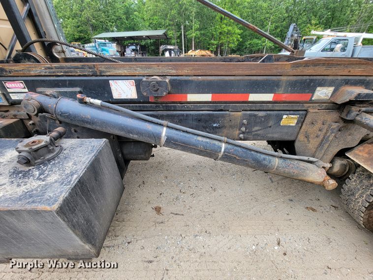 image for item IF9843 1999 Sterling A9500  roll-off container truck