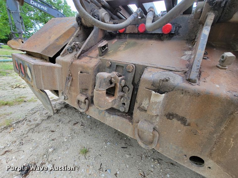 image for item IF9843 1999 Sterling A9500  roll-off container truck