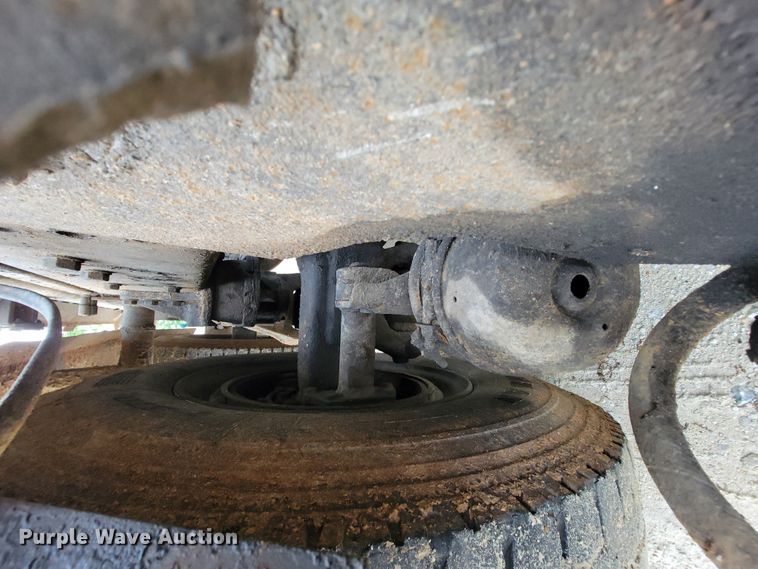 image for item IF9843 1999 Sterling A9500  roll-off container truck