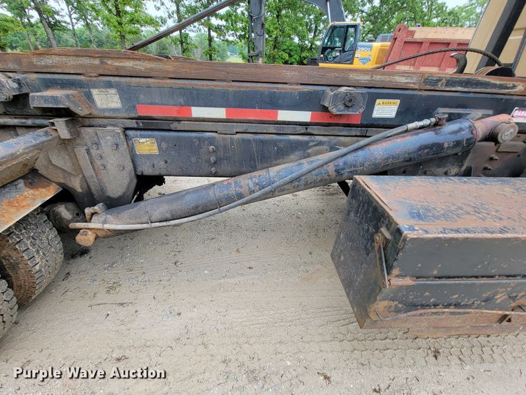 image for item IF9843 1999 Sterling A9500  roll-off container truck