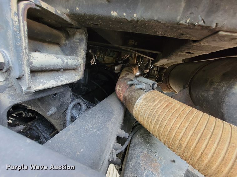 image for item IF9843 1999 Sterling A9500  roll-off container truck