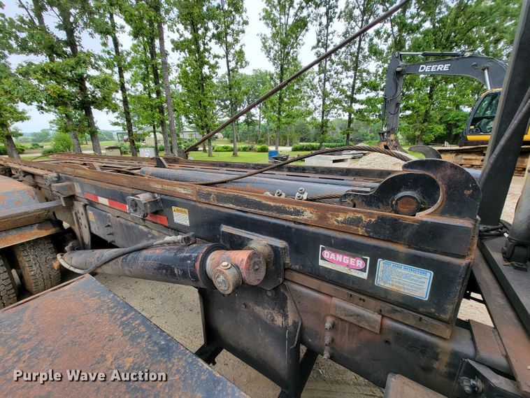 image for item IF9843 1999 Sterling A9500  roll-off container truck