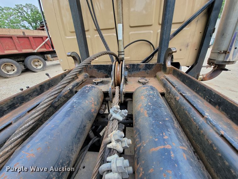 image for item IF9843 1999 Sterling A9500  roll-off container truck