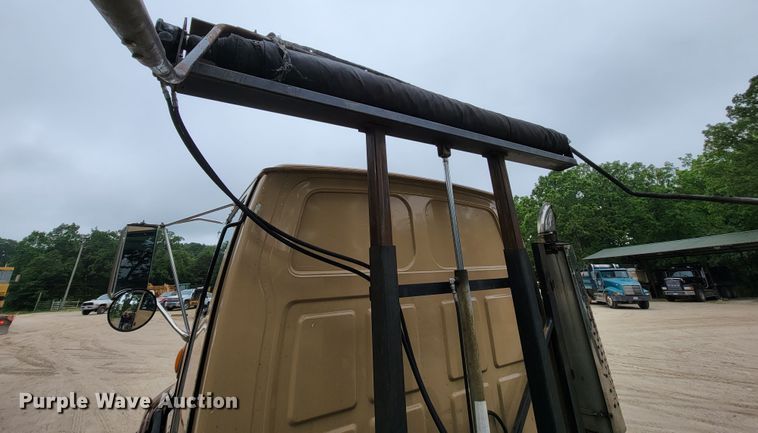 image for item IF9843 1999 Sterling A9500  roll-off container truck