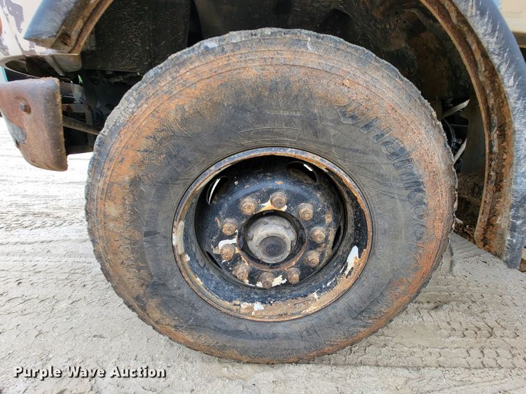 image for item IF9843 1999 Sterling A9500  roll-off container truck