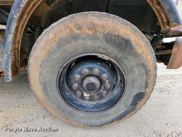 image for item IF9843 1999 Sterling A9500  roll-off container truck