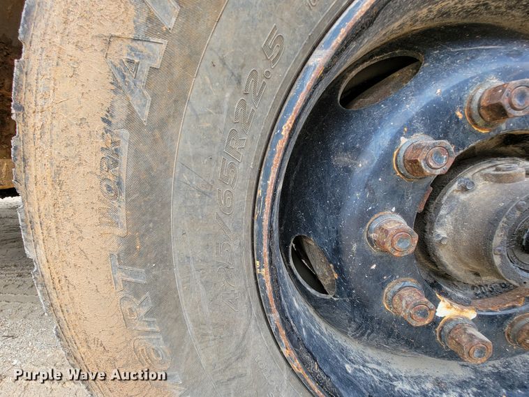 image for item IF9843 1999 Sterling A9500  roll-off container truck