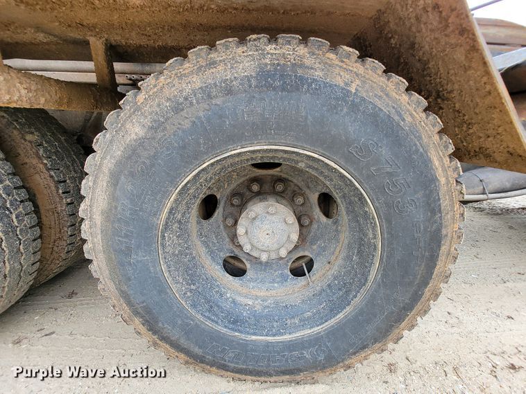 image for item IF9843 1999 Sterling A9500  roll-off container truck