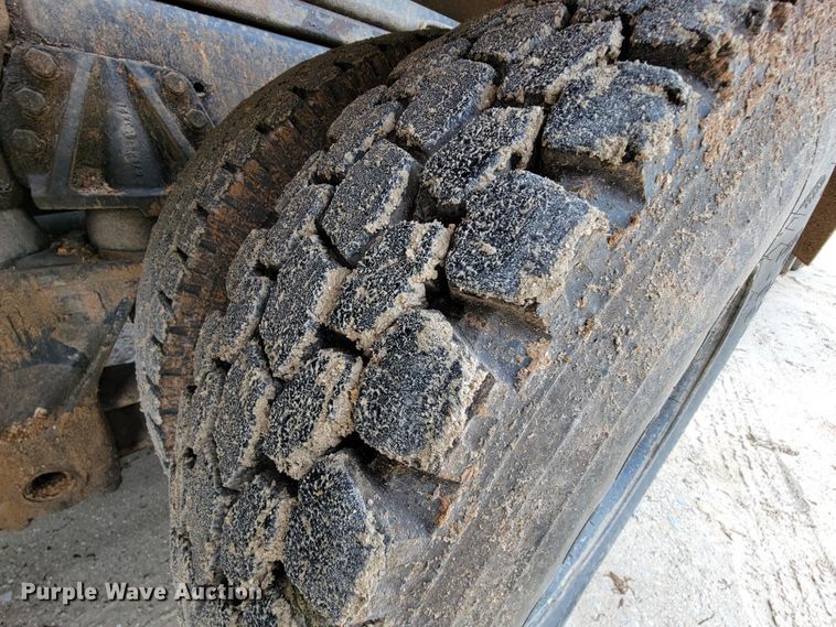 image for item IF9843 1999 Sterling A9500  roll-off container truck