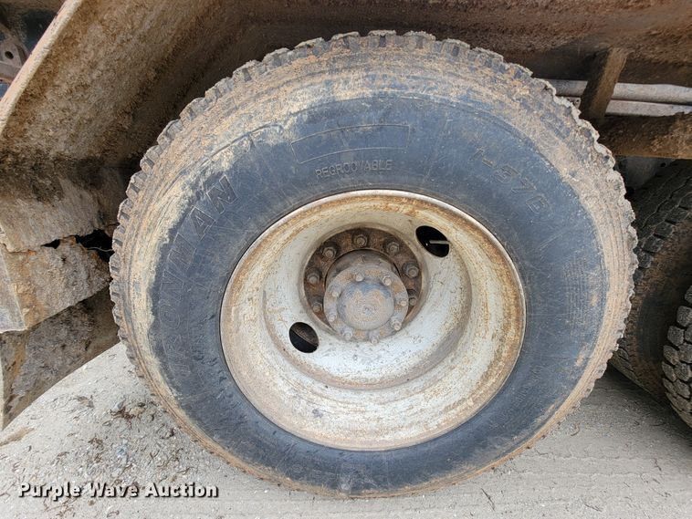 image for item IF9843 1999 Sterling A9500  roll-off container truck