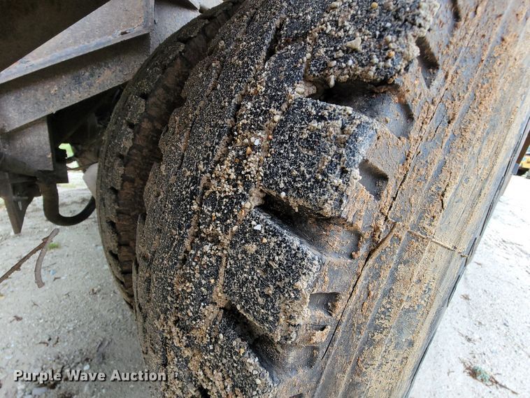 image for item IF9843 1999 Sterling A9500  roll-off container truck