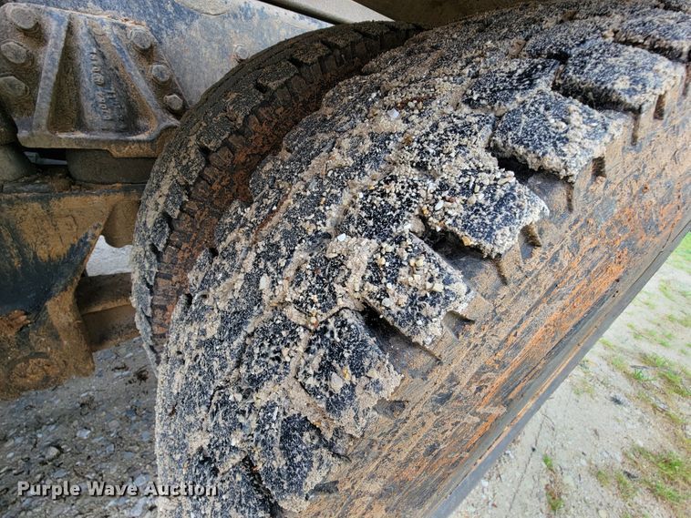 image for item IF9843 1999 Sterling A9500  roll-off container truck