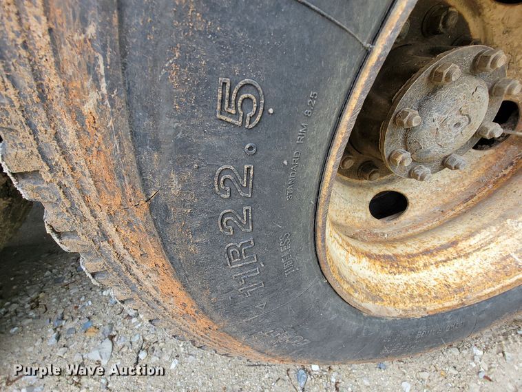 image for item IF9843 1999 Sterling A9500  roll-off container truck