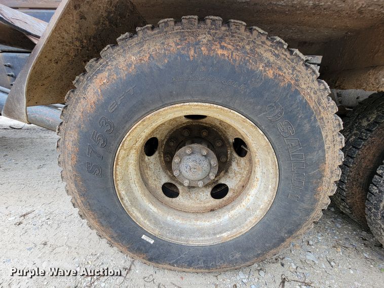 image for item IF9843 1999 Sterling A9500  roll-off container truck