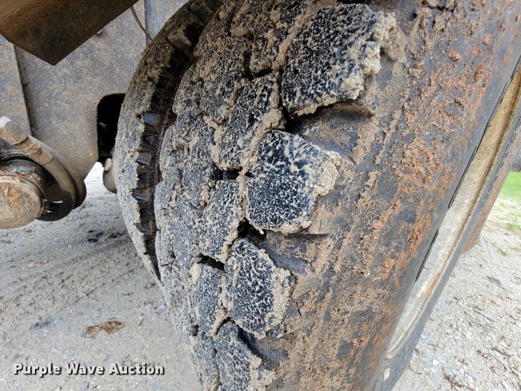 image for item IF9843 1999 Sterling A9500  roll-off container truck