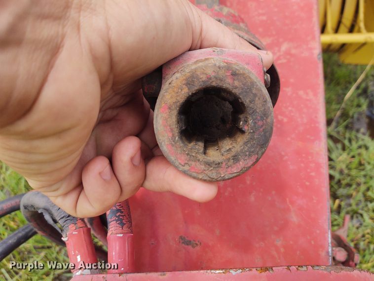 image for item FC9028 1983 New Holland 849  Auto-Wrap round baler