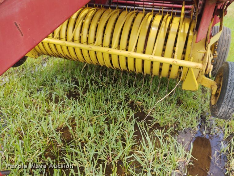 image for item FC9028 1983 New Holland 849  Auto-Wrap round baler