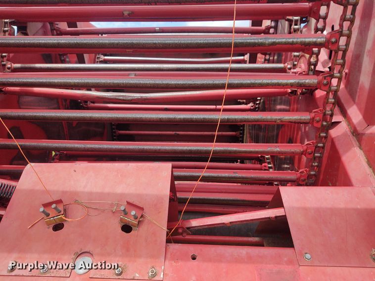 image for item FC9028 1983 New Holland 849  Auto-Wrap round baler