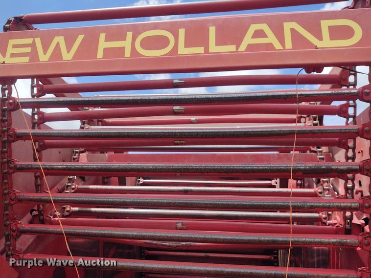 image for item FC9028 1983 New Holland 849  Auto-Wrap round baler