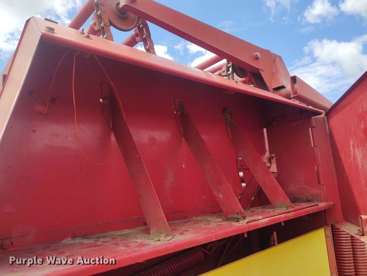 image for item FC9028 1983 New Holland 849  Auto-Wrap round baler