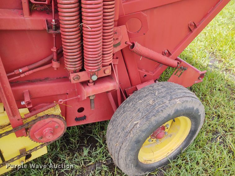 image for item FC9028 1983 New Holland 849  Auto-Wrap round baler