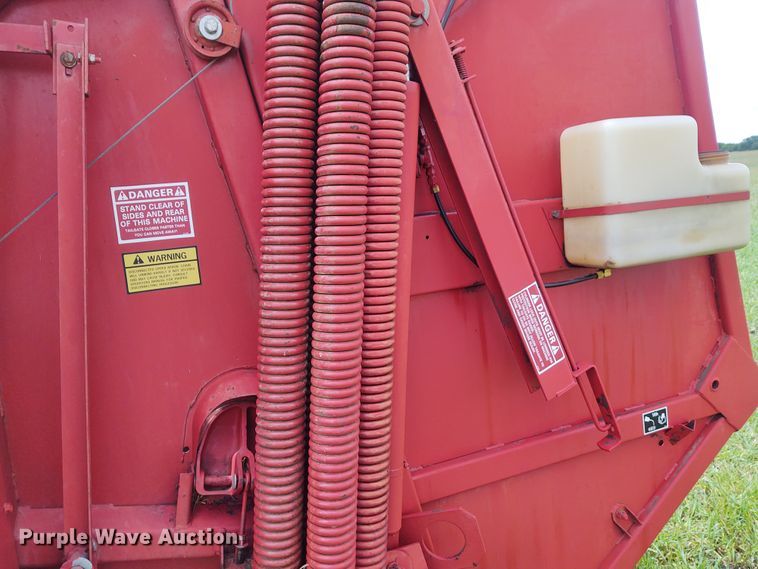 image for item FC9028 1983 New Holland 849  Auto-Wrap round baler