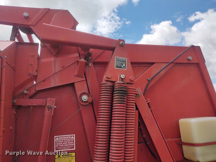 image for item FC9028 1983 New Holland 849  Auto-Wrap round baler