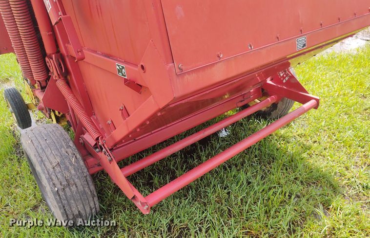 image for item FC9028 1983 New Holland 849  Auto-Wrap round baler