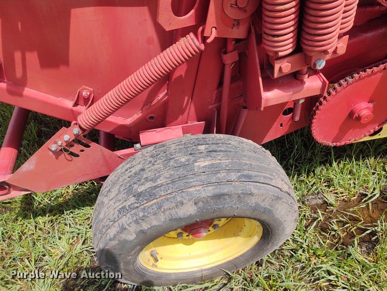 image for item FC9028 1983 New Holland 849  Auto-Wrap round baler