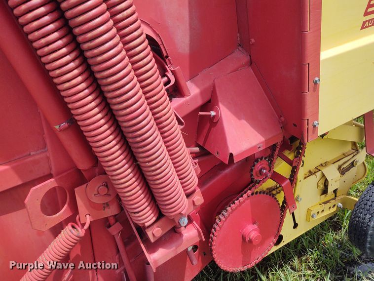 image for item FC9028 1983 New Holland 849  Auto-Wrap round baler