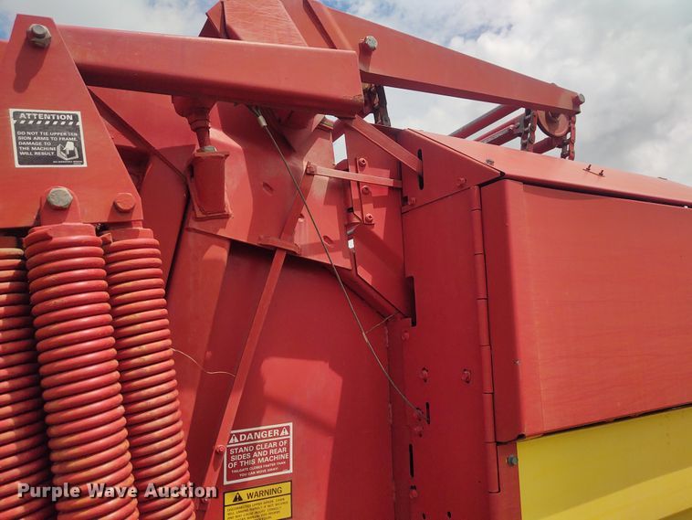 image for item FC9028 1983 New Holland 849  Auto-Wrap round baler