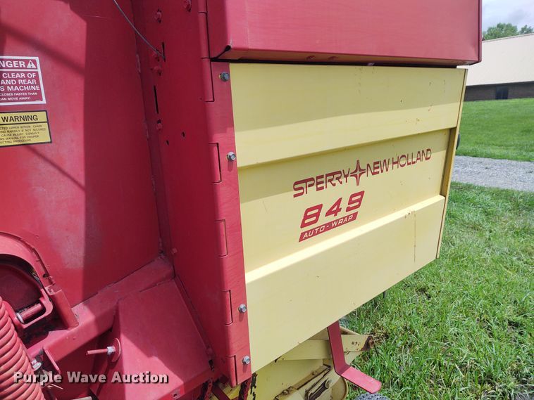 image for item FC9028 1983 New Holland 849  Auto-Wrap round baler