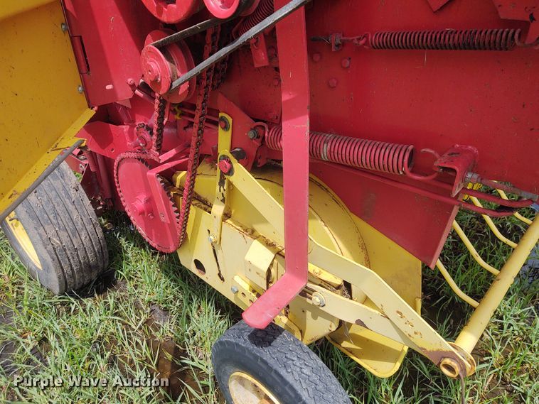 image for item FC9028 1983 New Holland 849  Auto-Wrap round baler