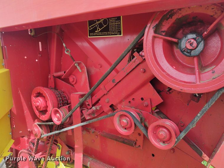 image for item FC9028 1983 New Holland 849  Auto-Wrap round baler