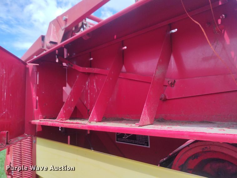 image for item FC9028 1983 New Holland 849  Auto-Wrap round baler