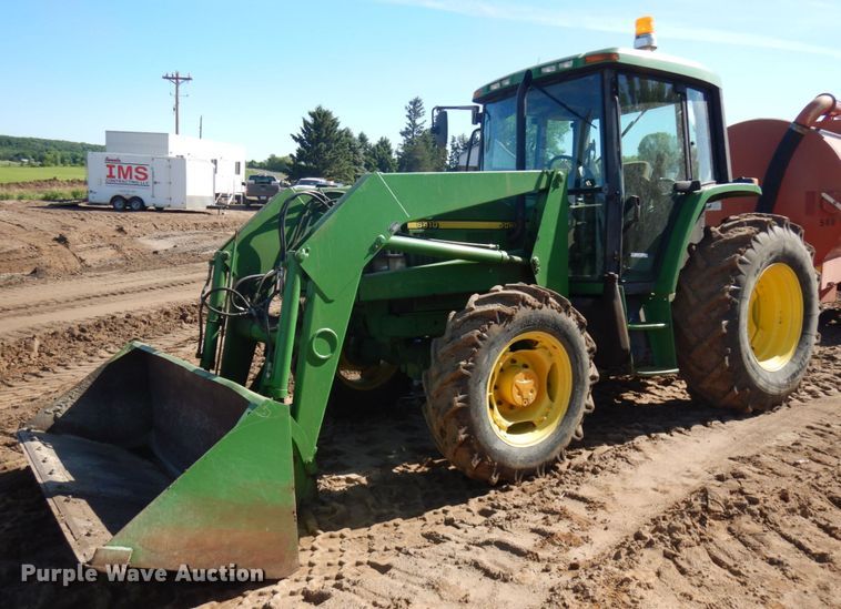 image for item IL9824 1998 John Deere 6410  MFWD tractor