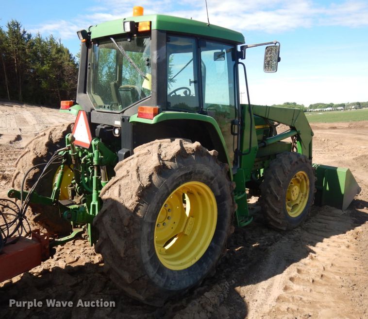 image for item IL9824 1998 John Deere 6410  MFWD tractor