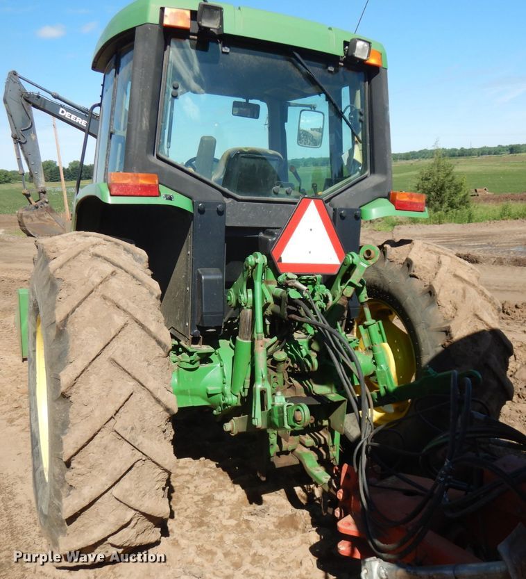 image for item IL9824 1998 John Deere 6410  MFWD tractor