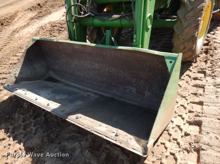 image for item IL9824 1998 John Deere 6410  MFWD tractor